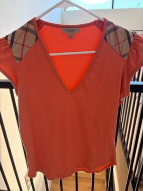 Burberry Coral Orange V-Neck Short Sleeve Top with Signature Check Shoulders